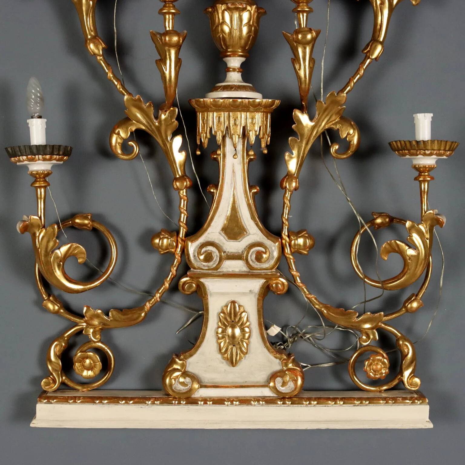 Antique wall sconces in wood and iron, Italy, mid-19th century.