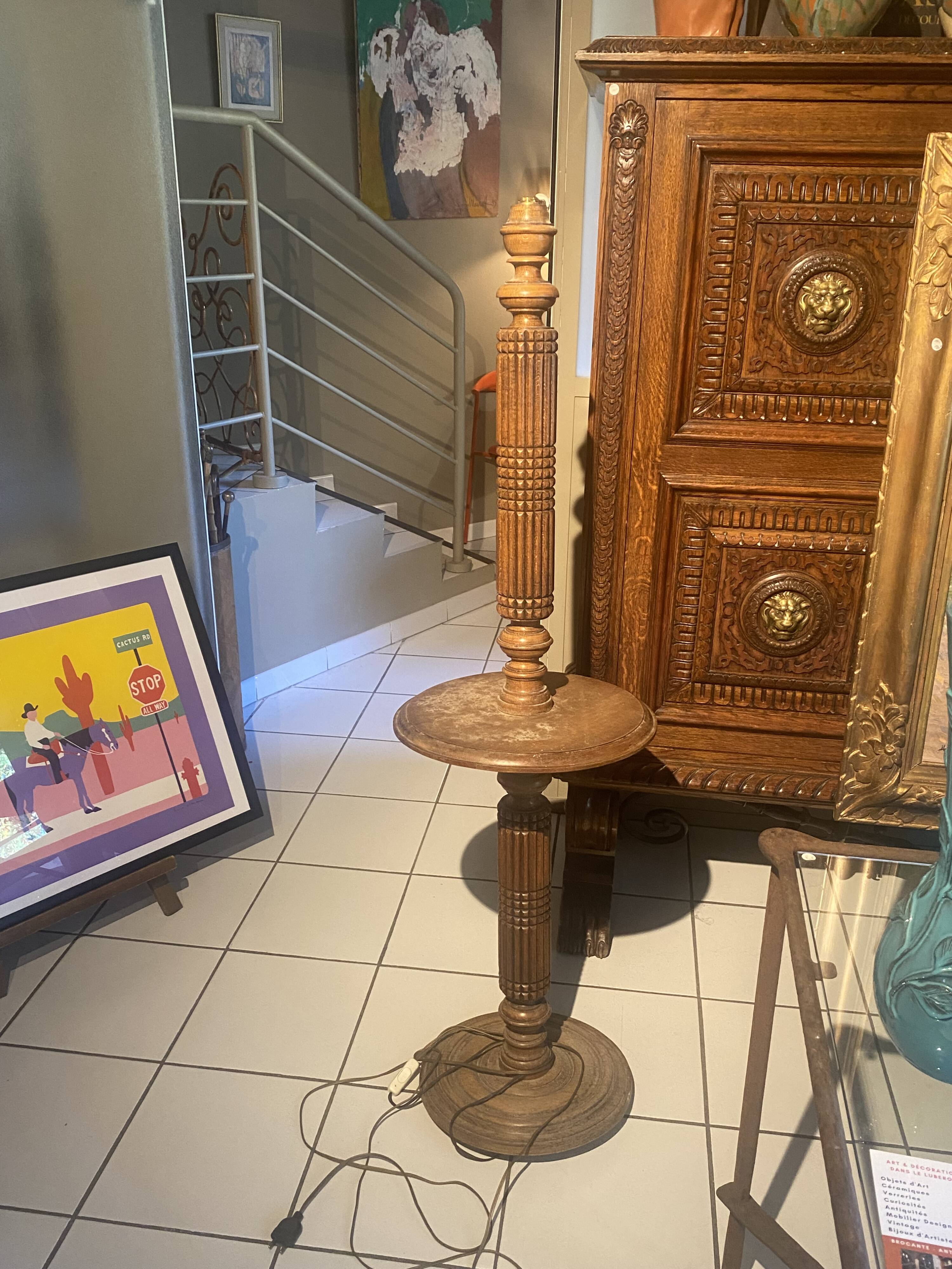 carved wooden floor lamp