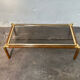 Gold metal coffee table with elm burl imitation.
