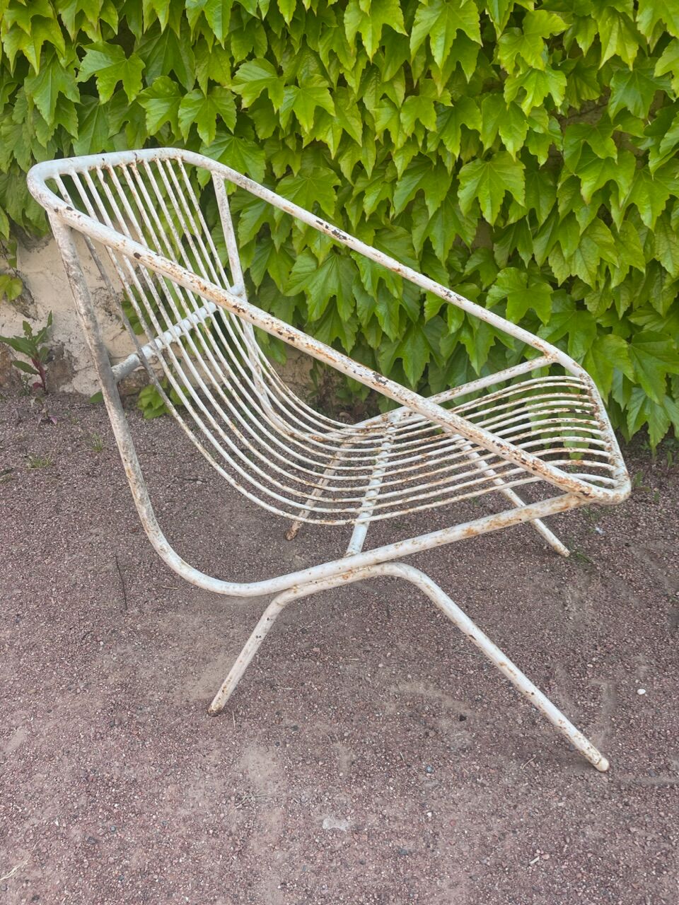 Pair of wrought iron armchairs year 60