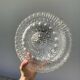 Pair of transparent round glass wall lights
