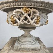 Large pair of 19th-century cast iron basins with vine decoration.