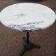 Bistro table in round marble of Parisian brasserie