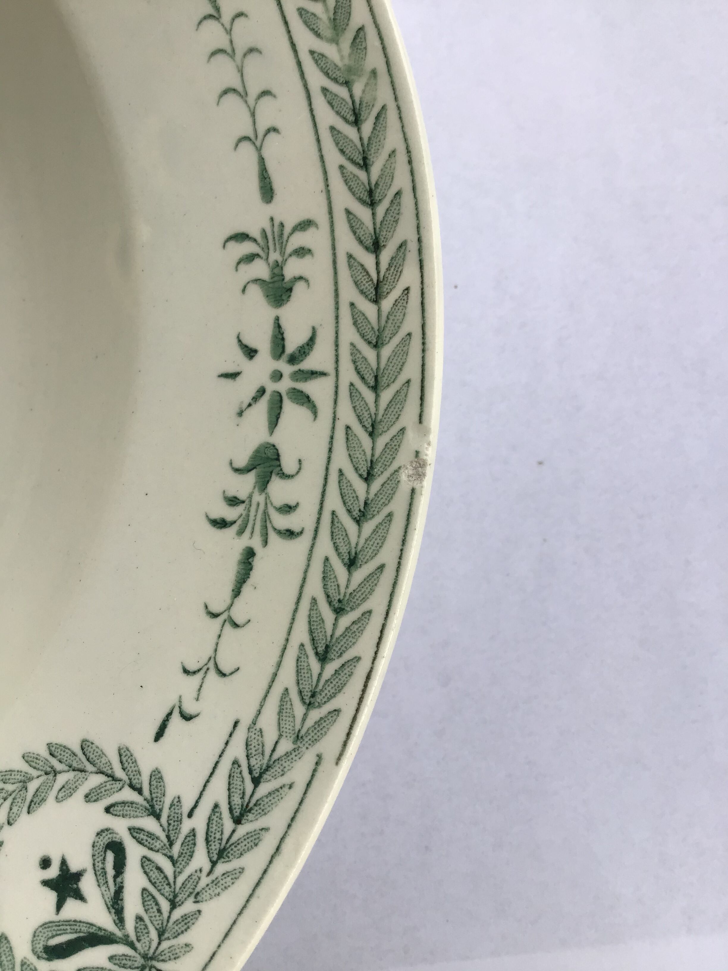 7 Old dark green Digoin hollow plates