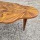 Vintage art deco coffee table with geometric marquetry