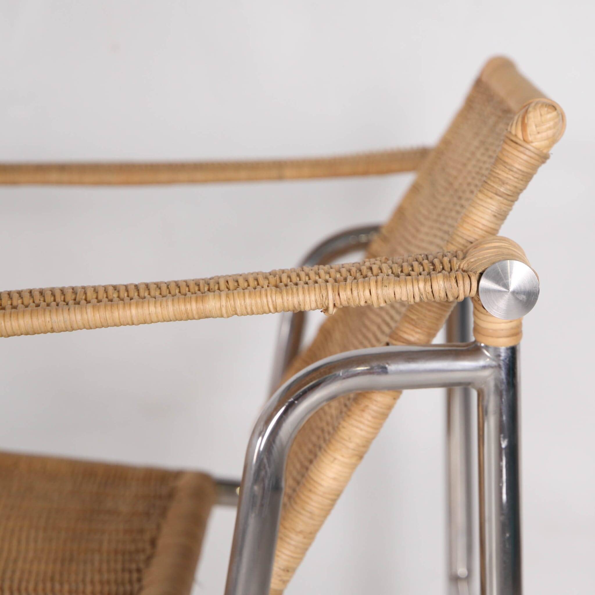 Pair of wicker and chrome armchairs