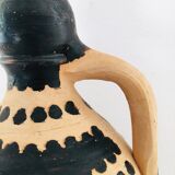 Raw and black terracotta jug
