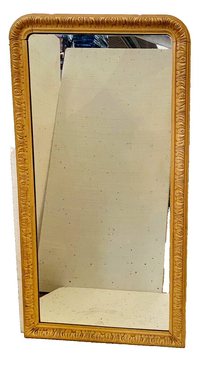 Louis Philippe mirror in wood and patinated stucco 19th century