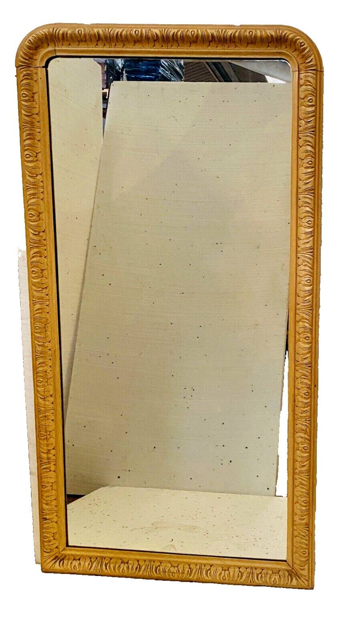 Louis Philippe mirror in wood and patinated stucco, 19th century.