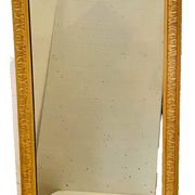 Louis Philippe mirror in wood and patinated stucco, 19th century.
