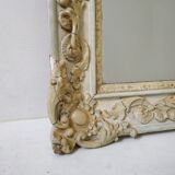 Ancient mirror carved entourage