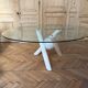 Dining table with glass top and marble base, Ligne Roset.