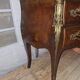 Commode sauteuse galbée de style Louis XV en marqueterie et bronzes dorés (