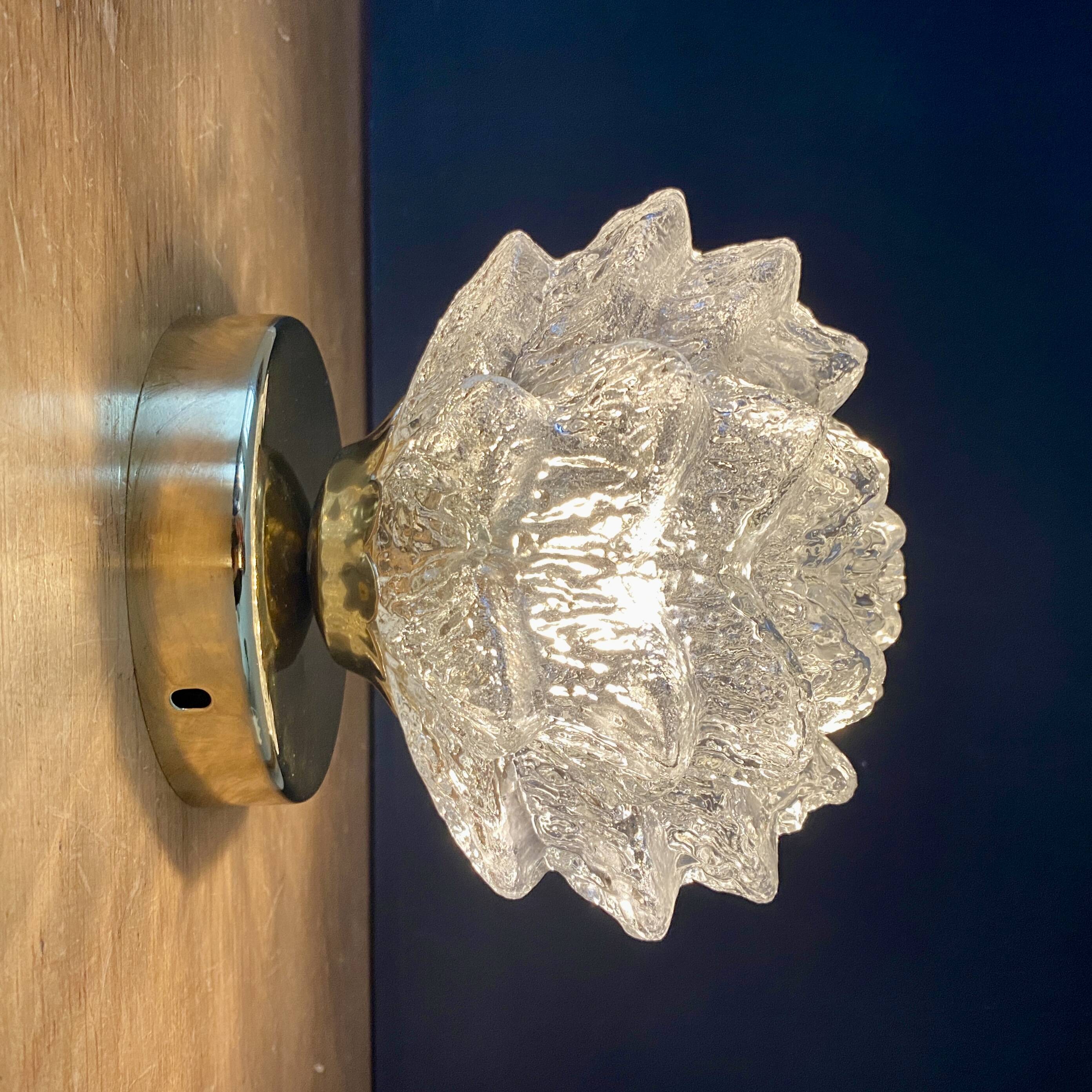 Vintage globe wall or ceiling light in molded glass in the shape of a flower