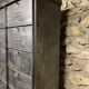 Industrial cladding furniture in brushed and patinated steel