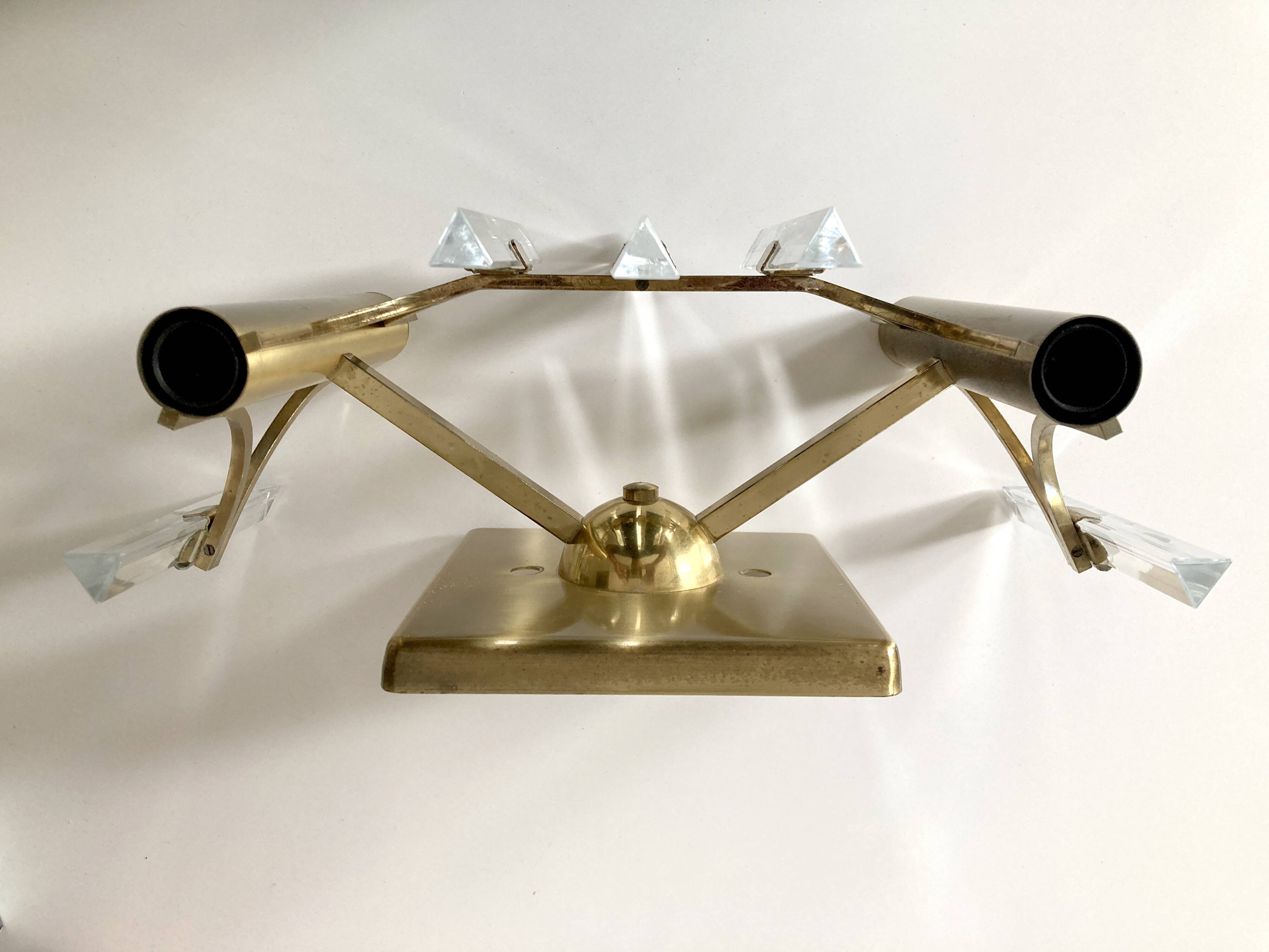 Golden wall lamp and glass crystals. 1970