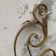 Golden wrought iron bedhead