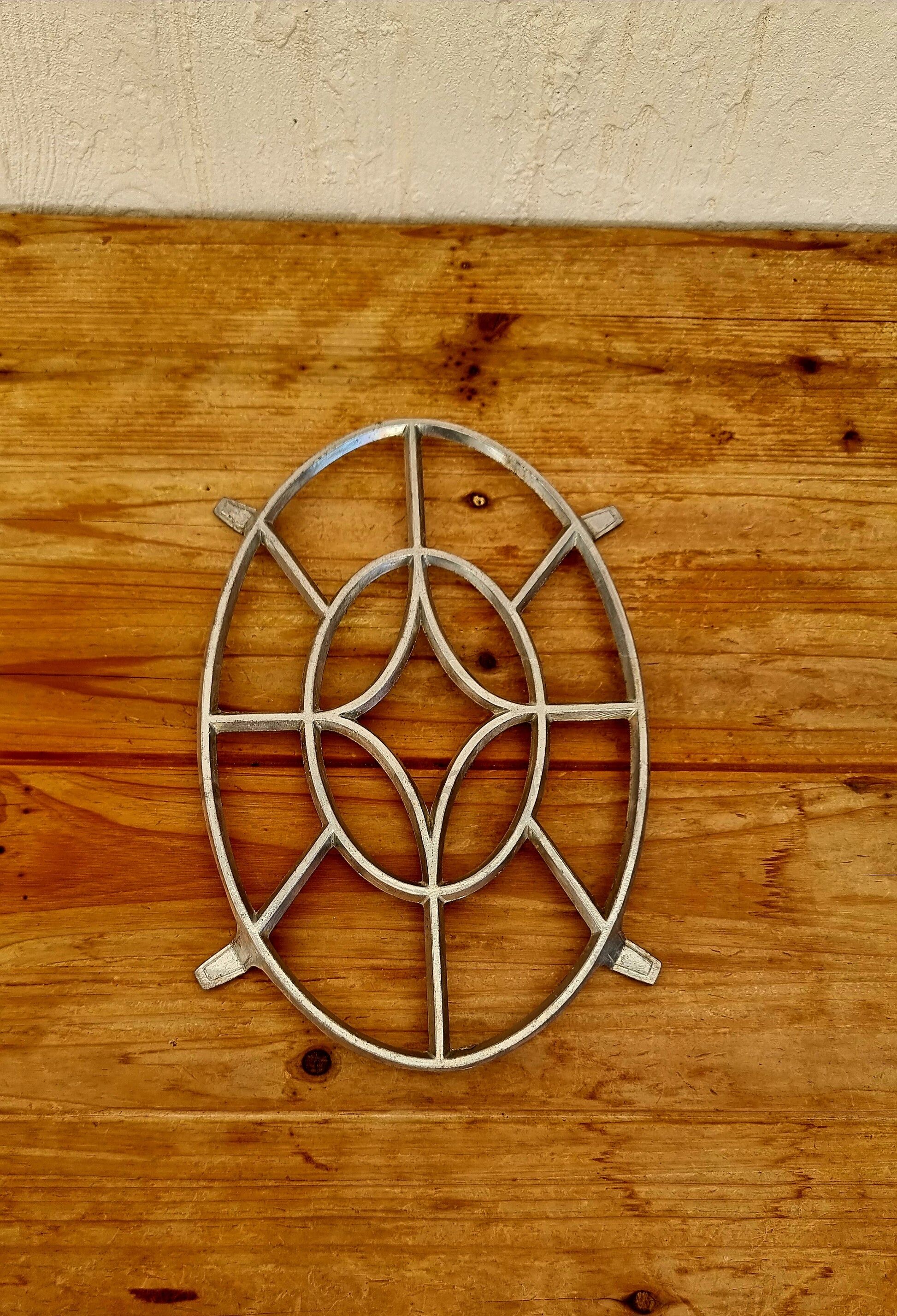 Vintage aluminium trivet