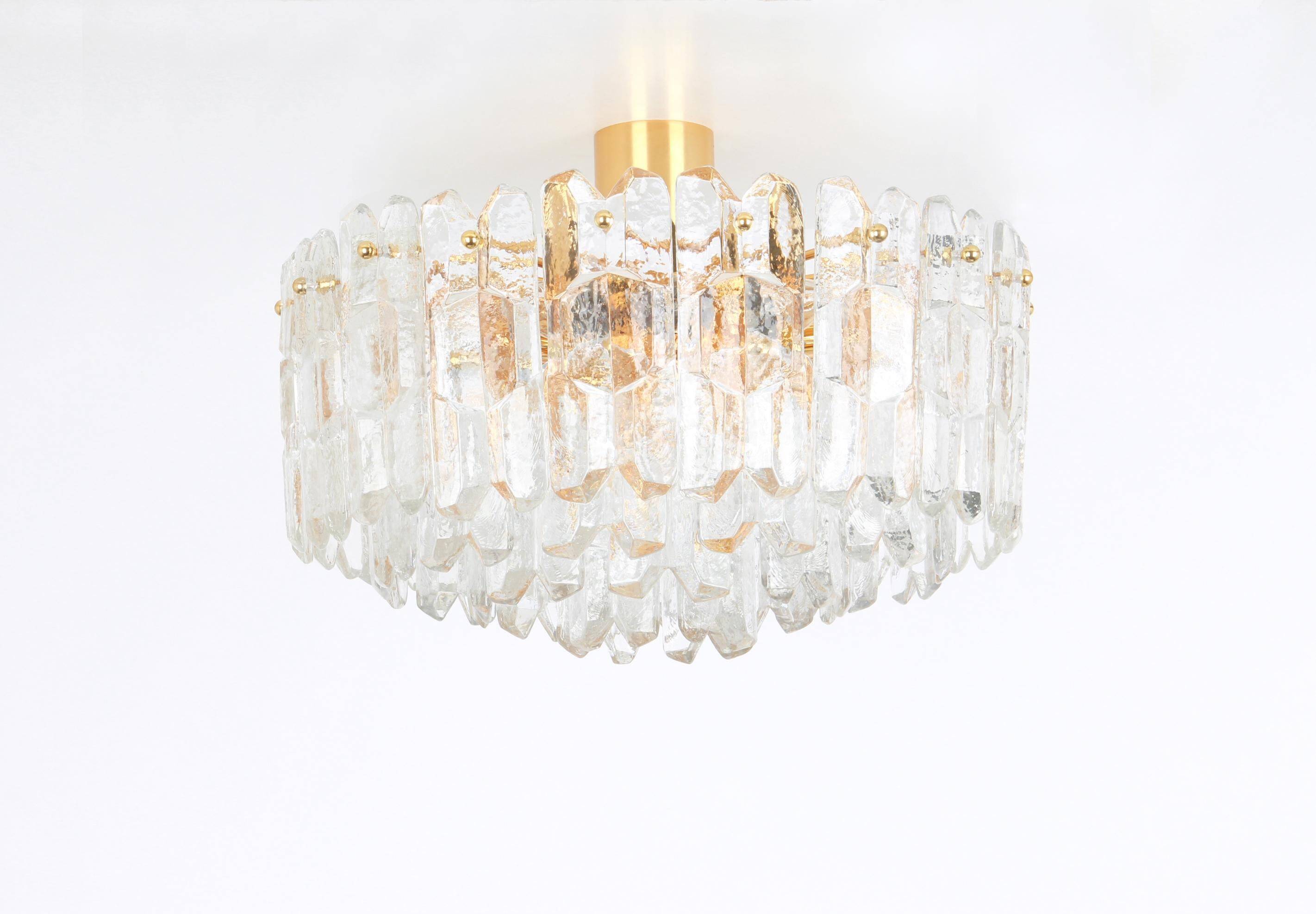 Magnificent luminaire in gilded brass and crystal glass Palazzo, Kalmar, Austria, 1970.