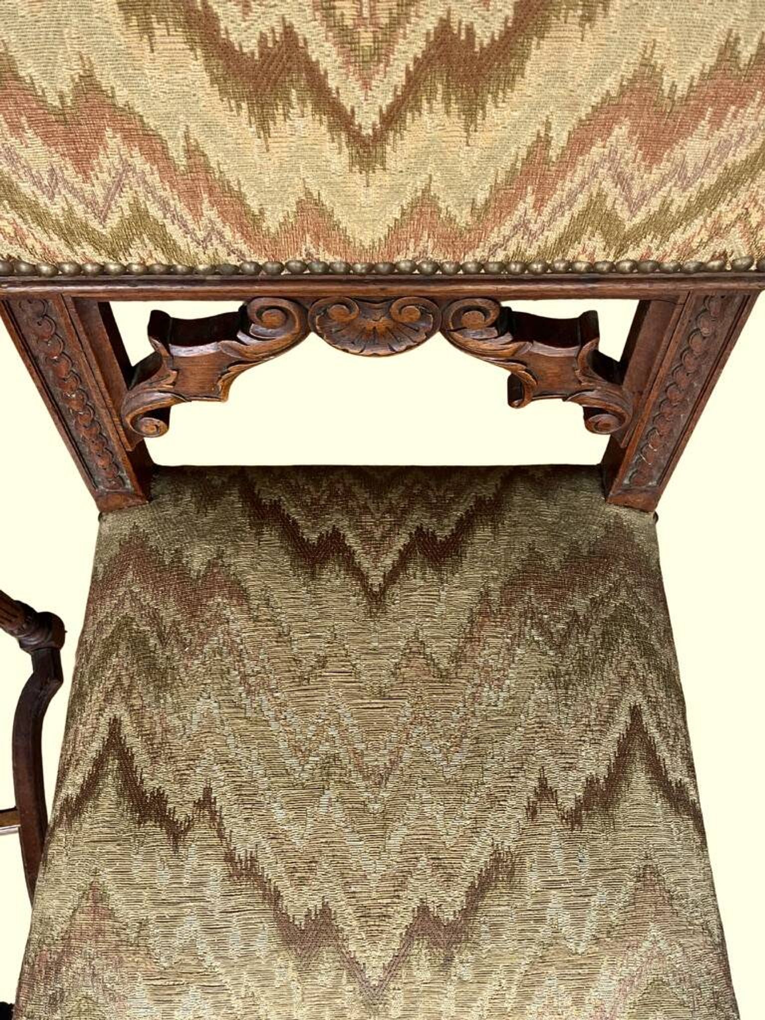 Pair of dining chairs, pair of carved Gothic chairs, set of Renaissance chairs.