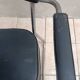 Vintage office chair in chrome metal and faux leather.