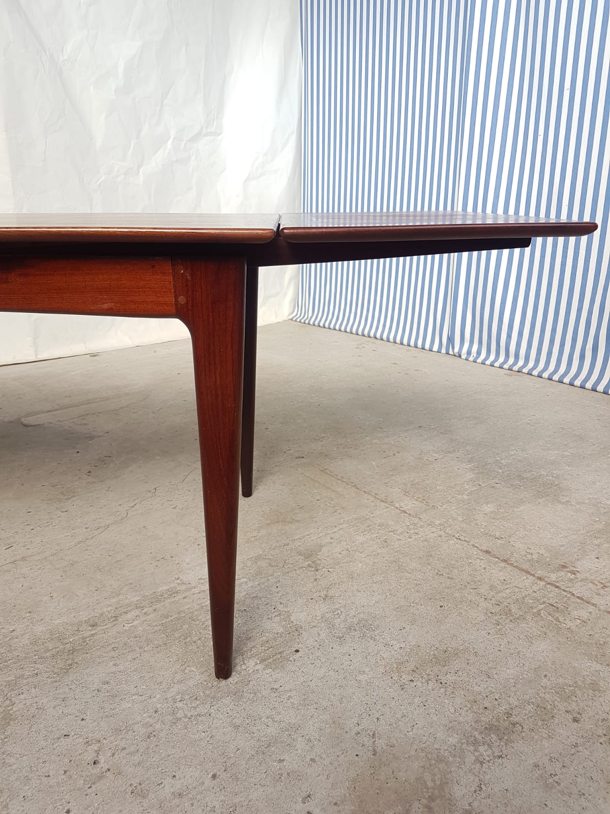 Teak extending dining table by Younger