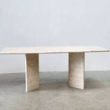 Sculptural travertine dining table