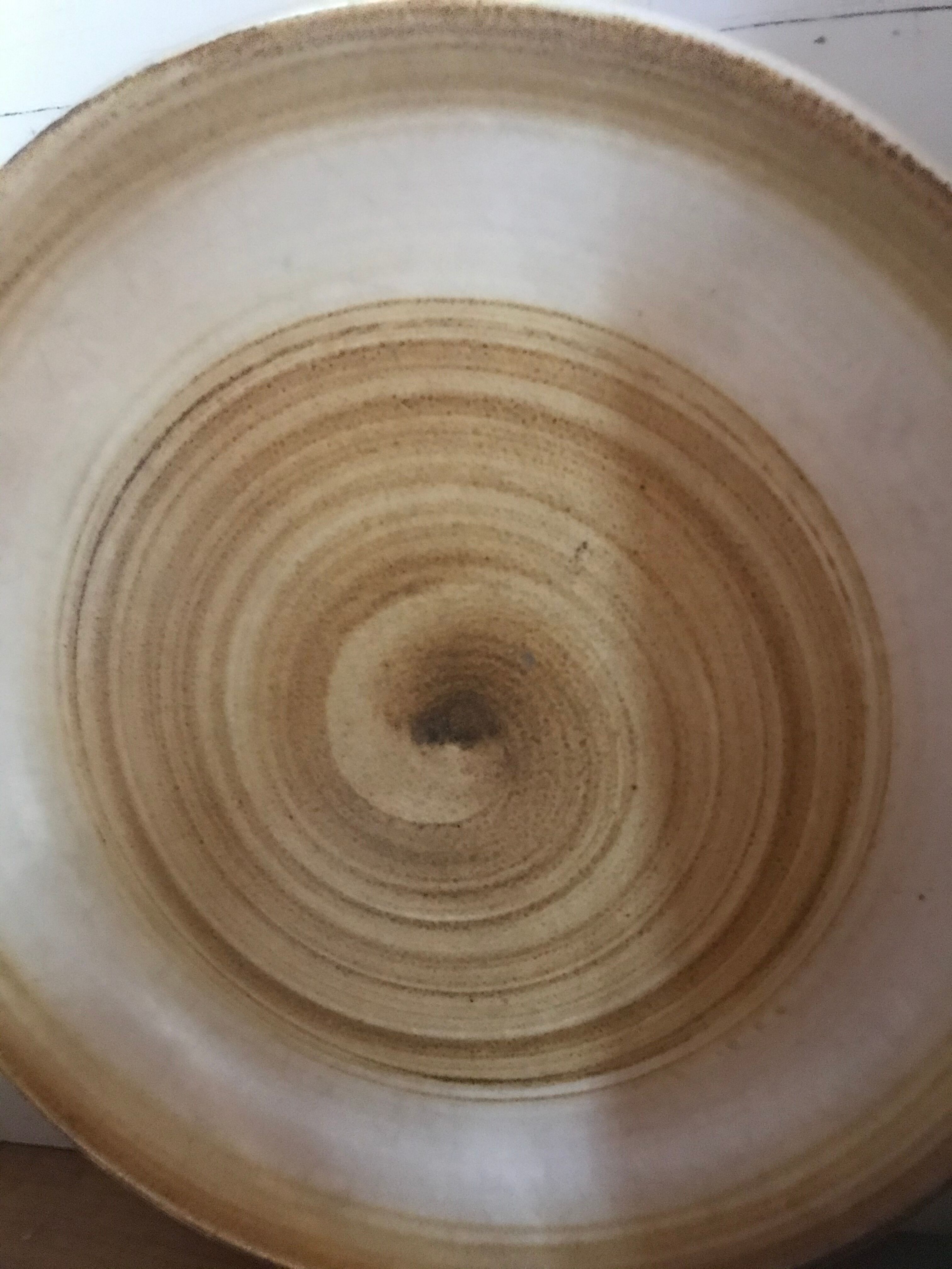 Six sandstone dessert plates by Longchamp