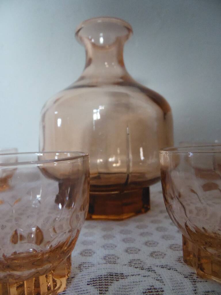 Pink glass liqueur carafe and 6 matching glasses