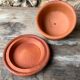 Cheese or butter bell in terracotta and its dish