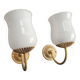 Pair of vintage gold-tone wall sconces with opaline glass globes