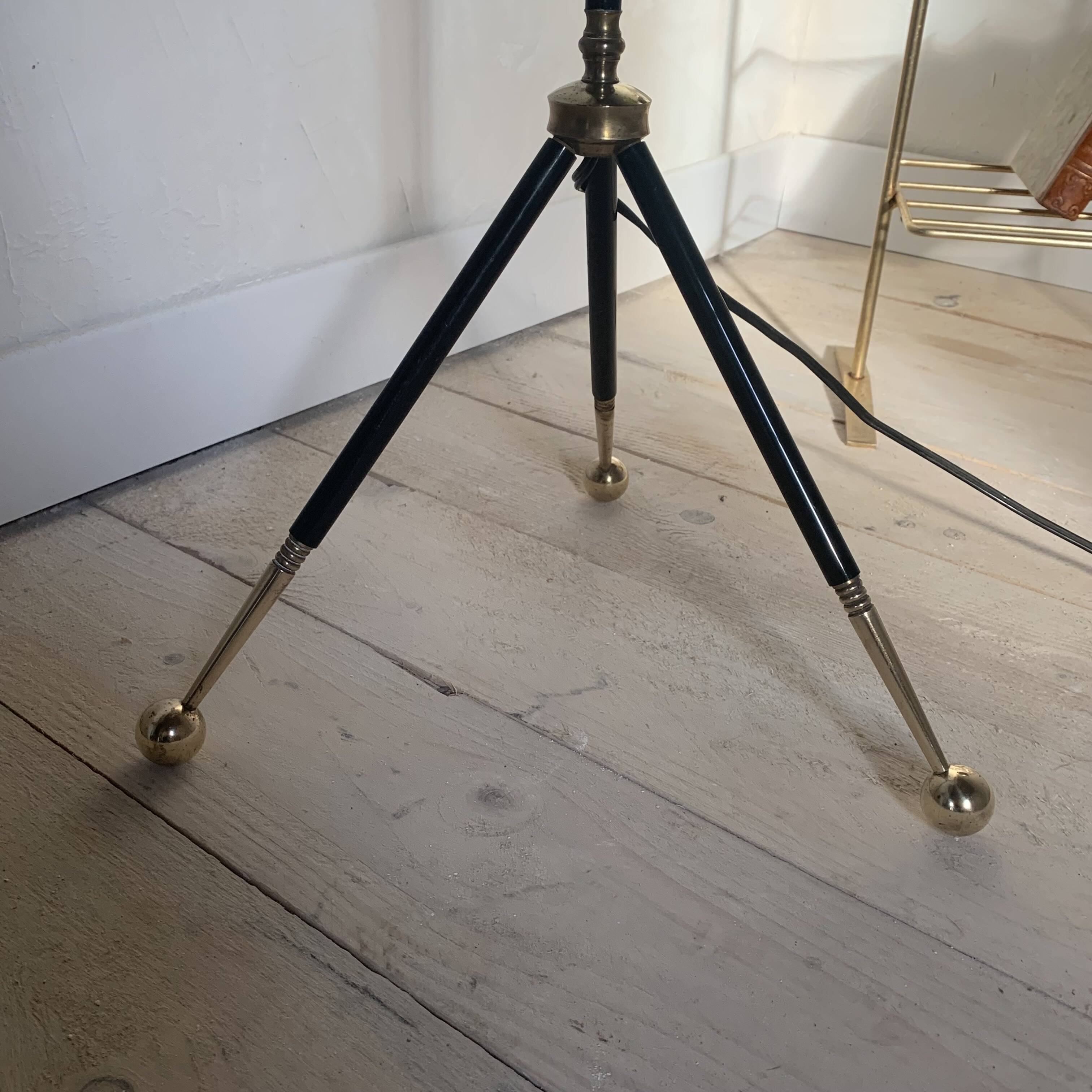 Vintage black metal tripod floor lamp and brass ball