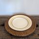 Set of 7 presentation plates in wicker rattan cannage