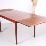 Danish teak draw-leaf dining table