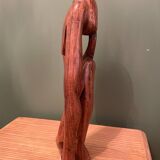 Wooden sculpture inspired by Rodin's "The Thinker"