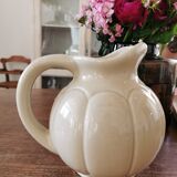 Enamelled ball pitcher