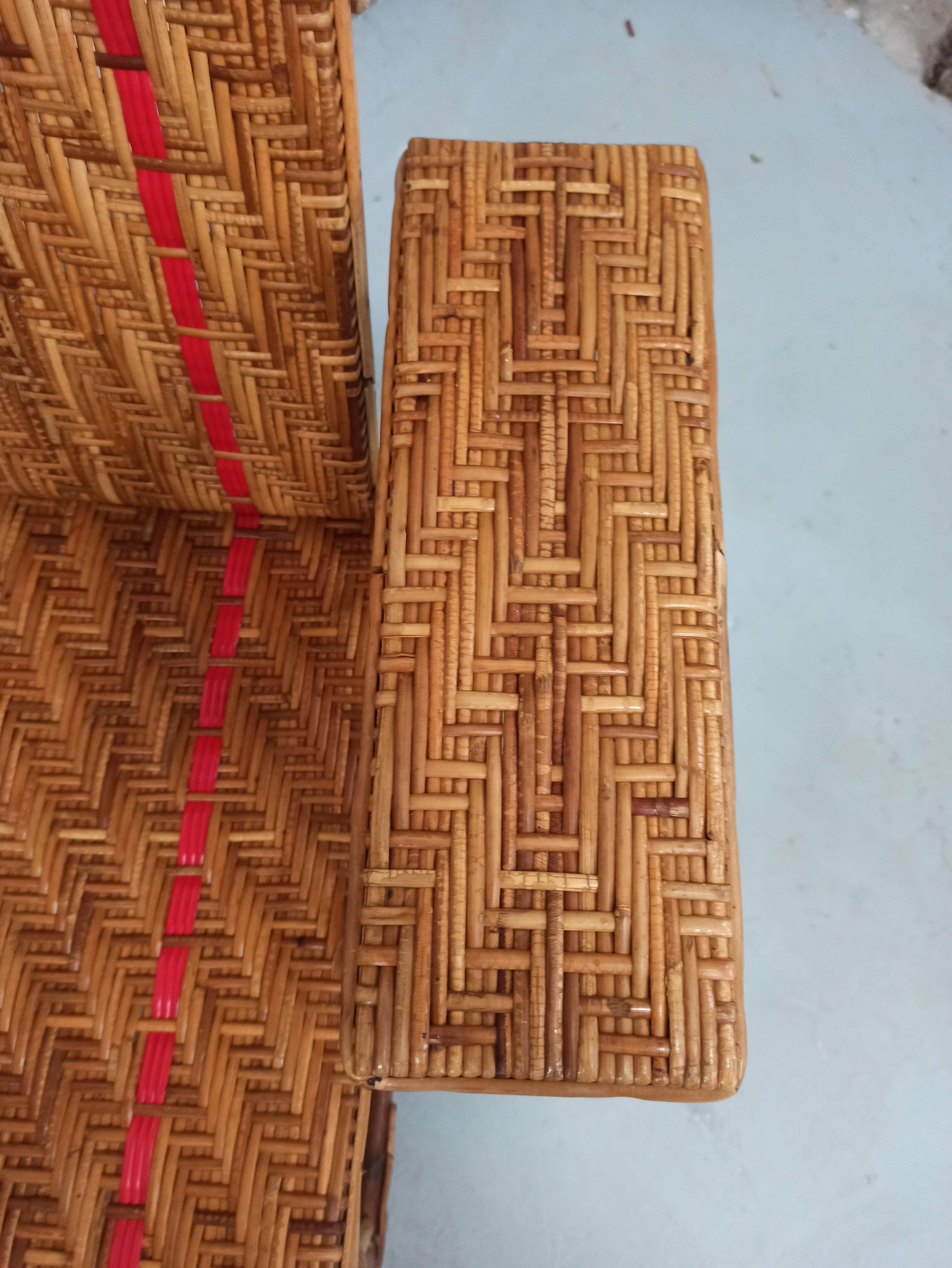 Sunbathing sunbathing in wicker rattan wood deckchair red lounger