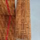 Sunbathing sunbathing in wicker rattan wood deckchair red lounger
