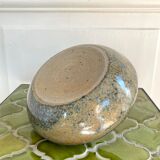 Pique vase flowers with sandstone cup