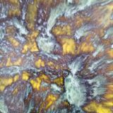 Set of 4 flamed enamel plates in green and amber from the 60s-70s.