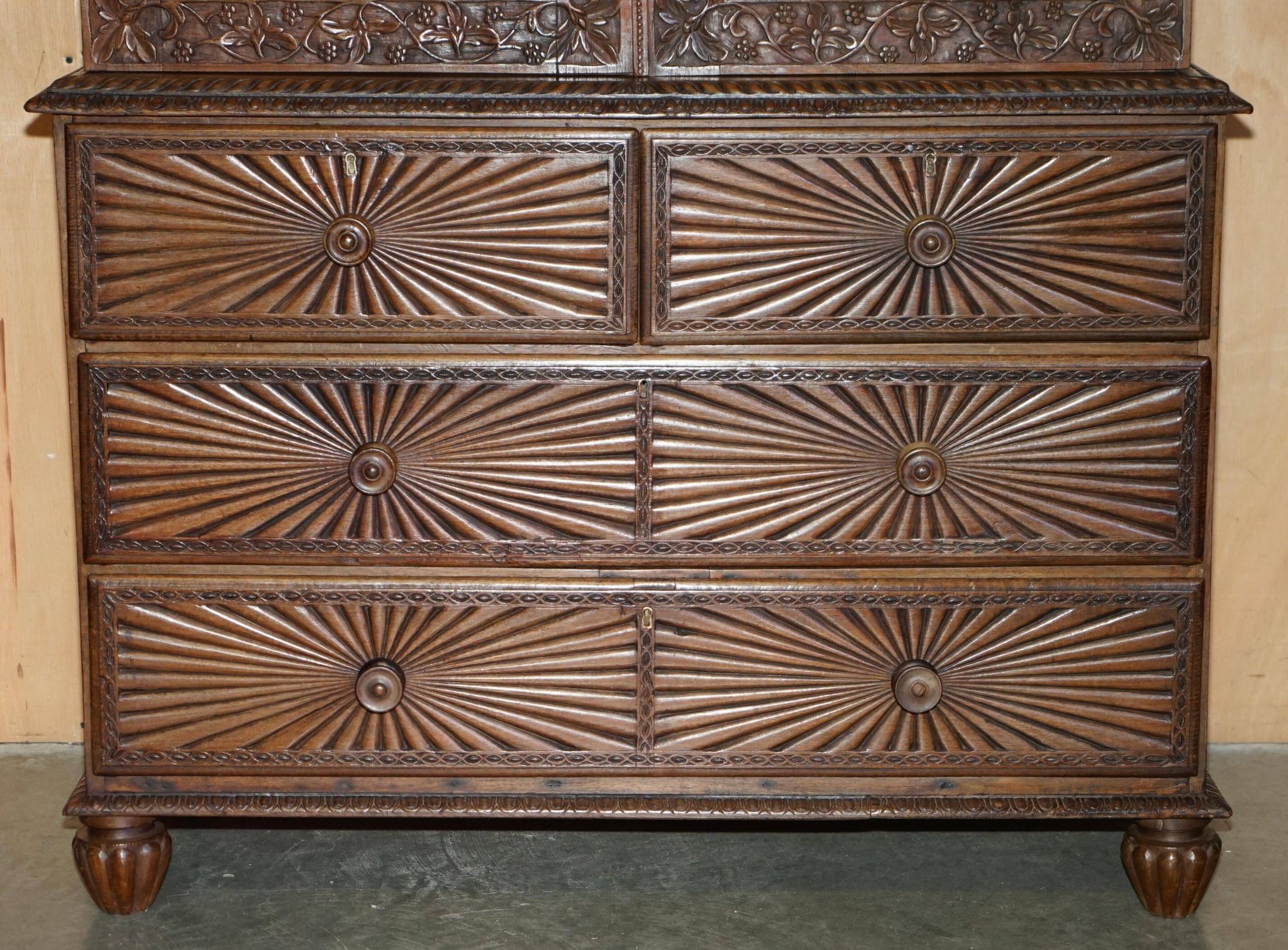 19th-century Anglo-Indian colonial hardwood library on a chest of drawers.