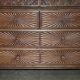 19th-century Anglo-Indian colonial hardwood library on a chest of drawers.