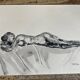 Black monochrome watercolor of a reclining woman signed