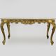 Coffee table with brass structure and marble top. 60s