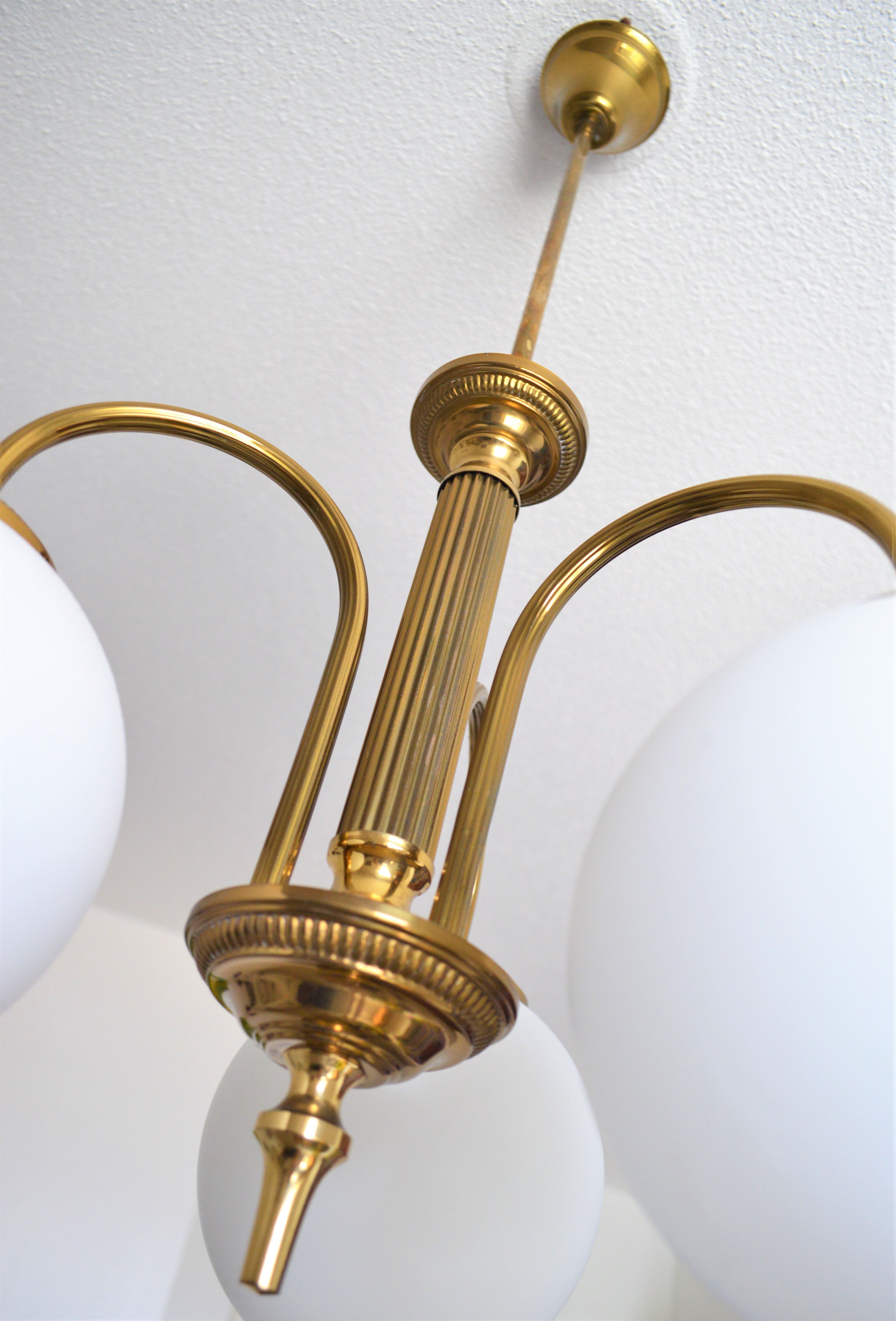 Vintage chandelier of the 60s in brass