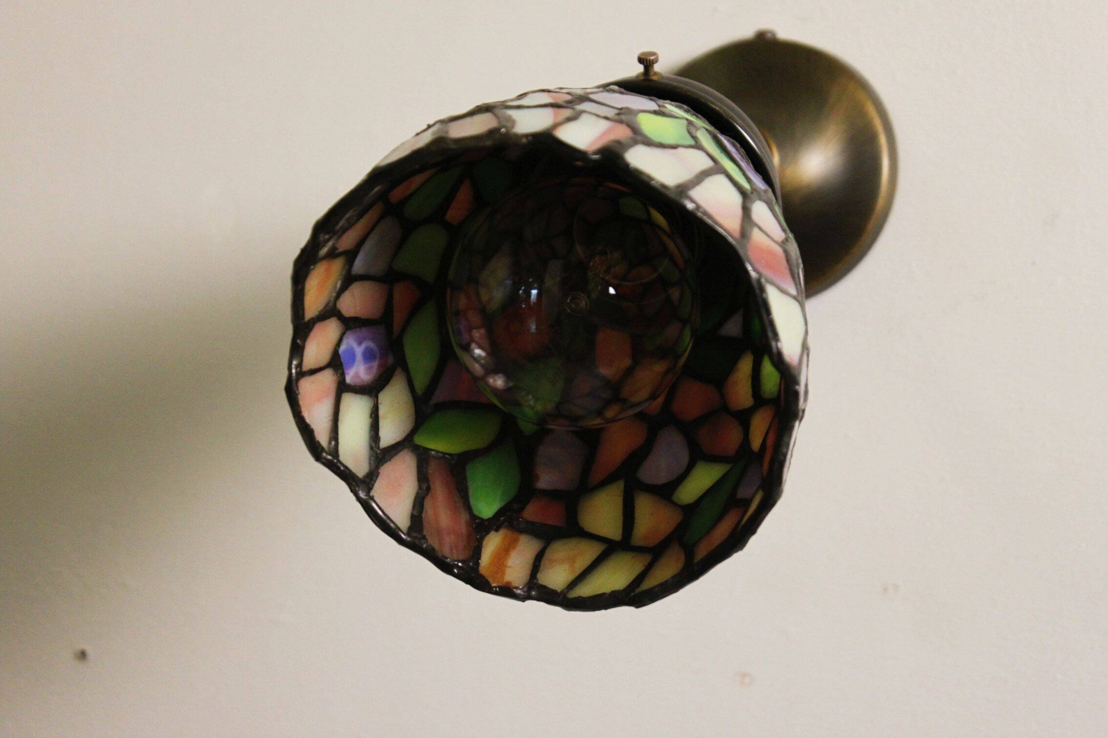 Tiffany lamp, stained glass and tin.