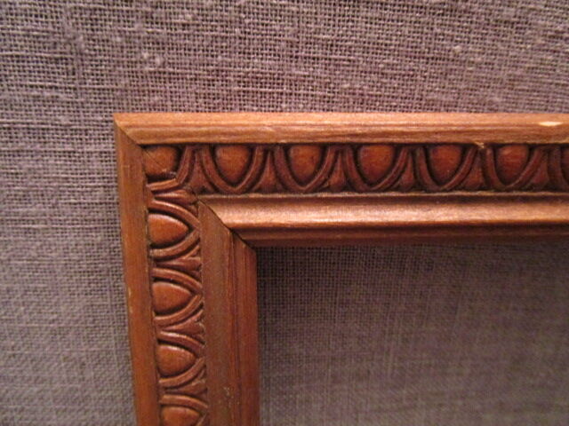 Old frame in worked wood