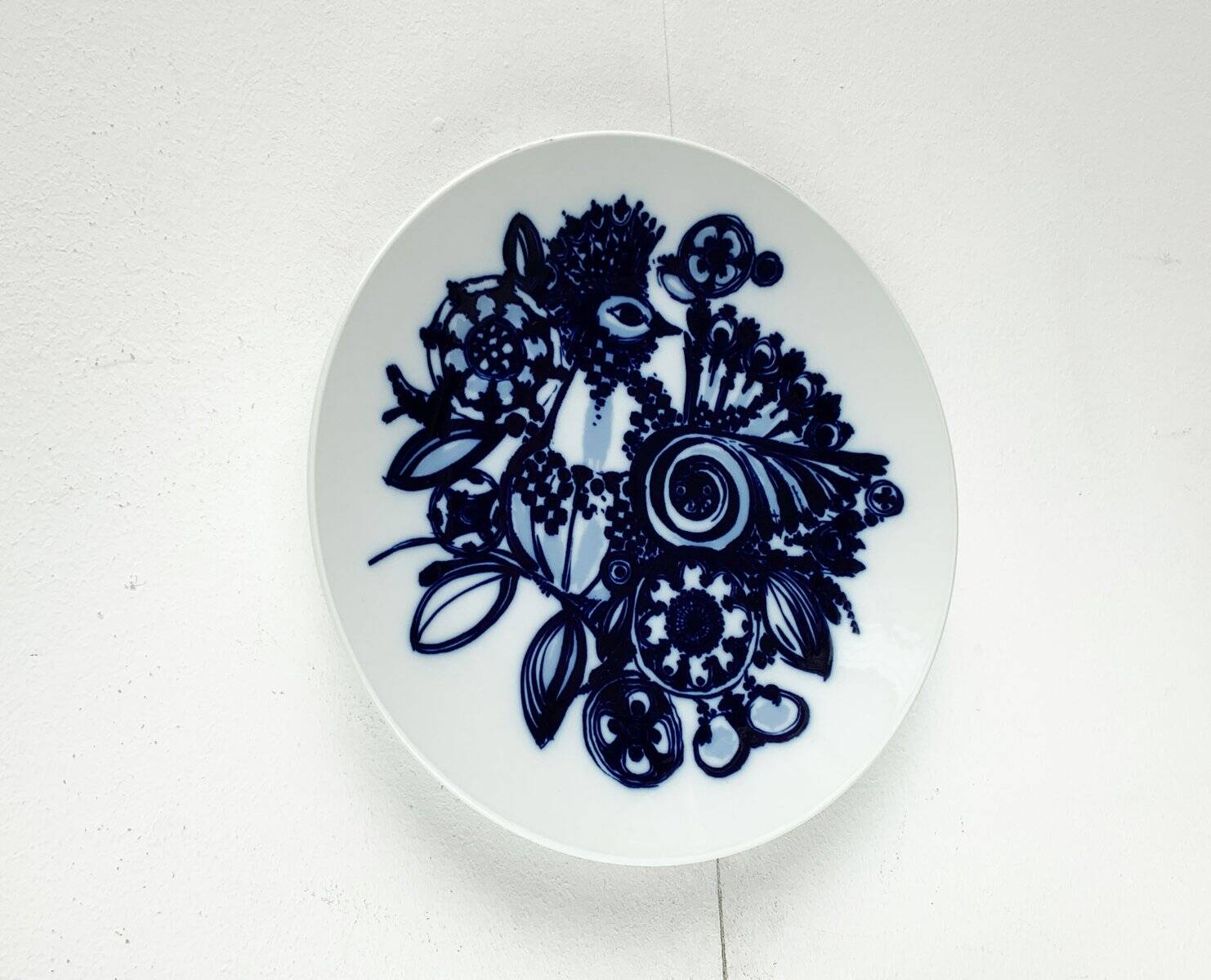 Vintage German peacock wall plate by Bjørn Wiinblad for Rosenthal, 1970s.
