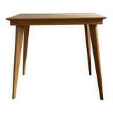 Side table with compass legs