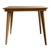 Side table with compass legs